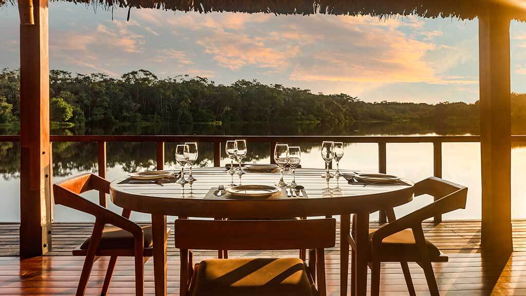 sacha lodge restaurant meals with lake backdrop ecuador jungle