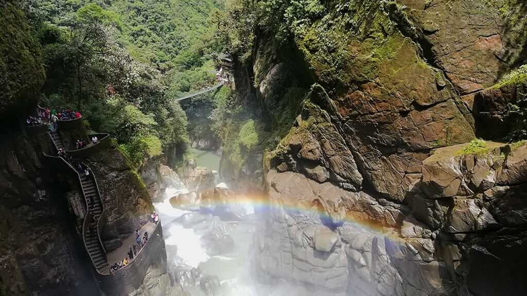 rainbow at pailon del diablo waterfall banos ecuador