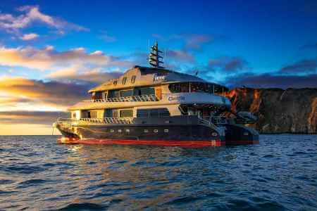 Camila yacht at sunset in the galapagos islands