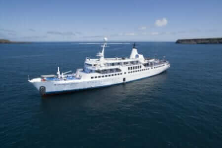 Legend cruise ship Galapagos Islands - side view of the ship in open water