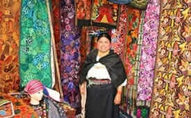 ecuador information - an indigenous indian woman at otavalo market