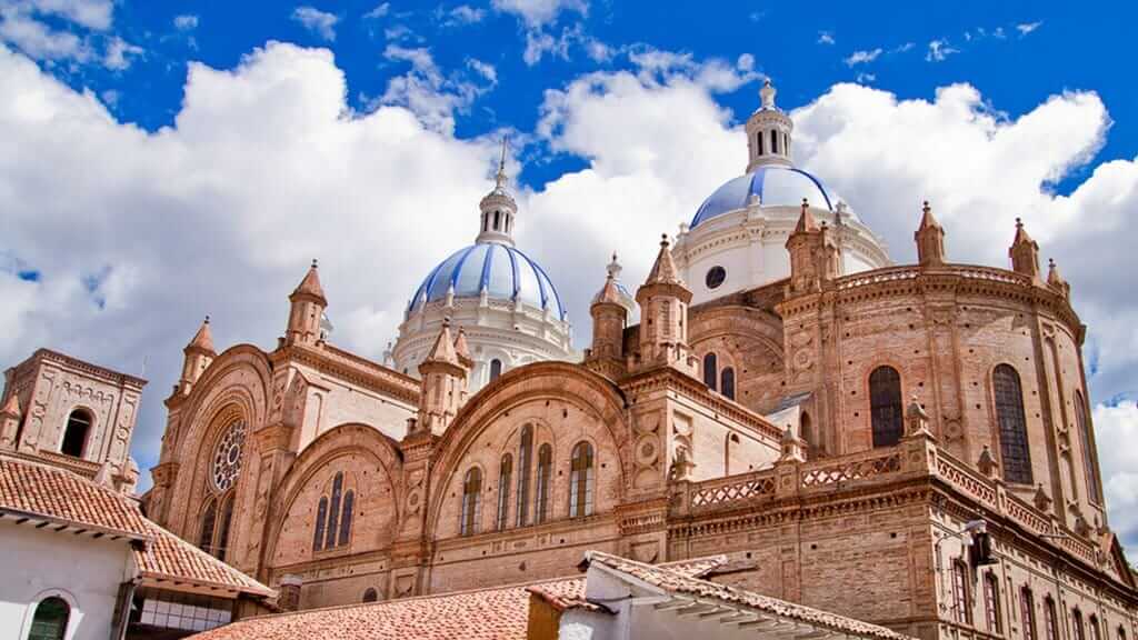 The blue domes of cuenca city cathedral in ecuador