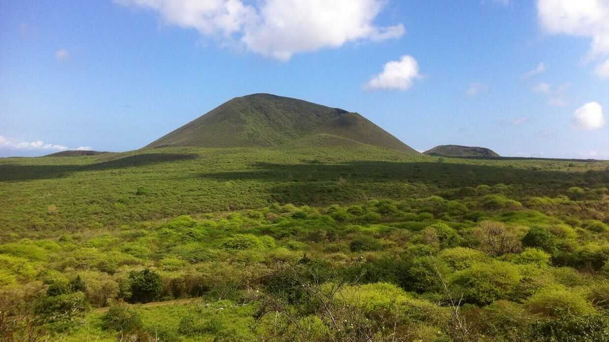 green hills and landscape of floreana island galapagos