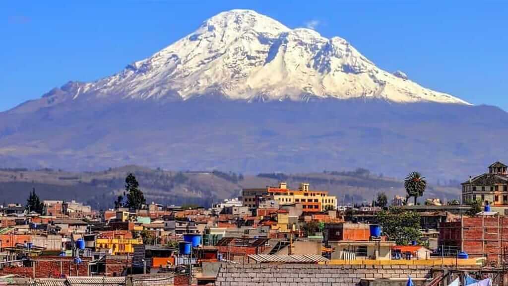 riobamba city in ecuador with chimborazo volcano backdrop