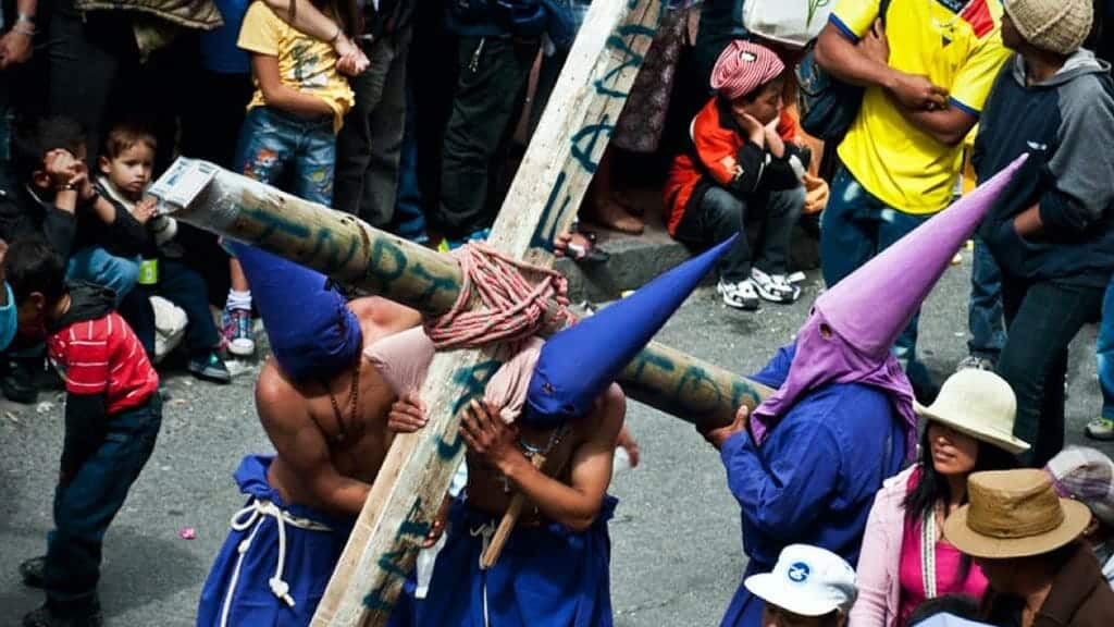 people carrying cross at the procession jesus of the great power quito