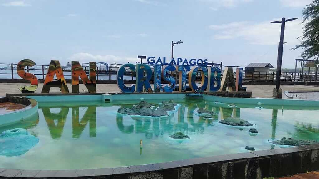 galapagos san cristobal sign on puerto baquerizo moreno seafront