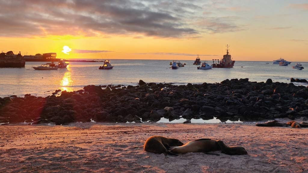 sunset over san cristobal galapagos islands