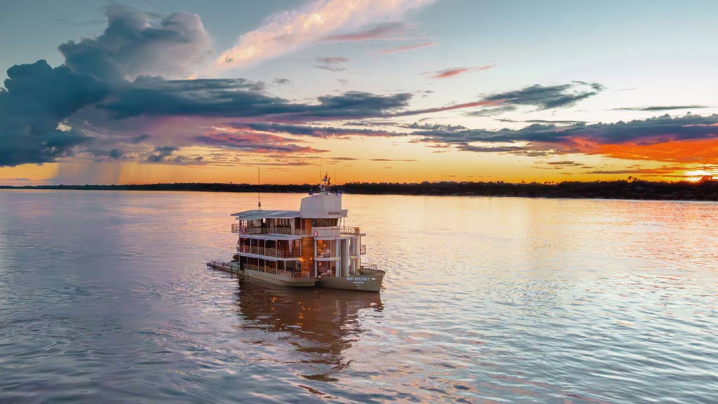 Delfin-I-amazon cruise ship at sunset