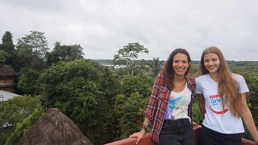 tourists enjoy canopy views from cuyabeno observation tower at caiman lodge