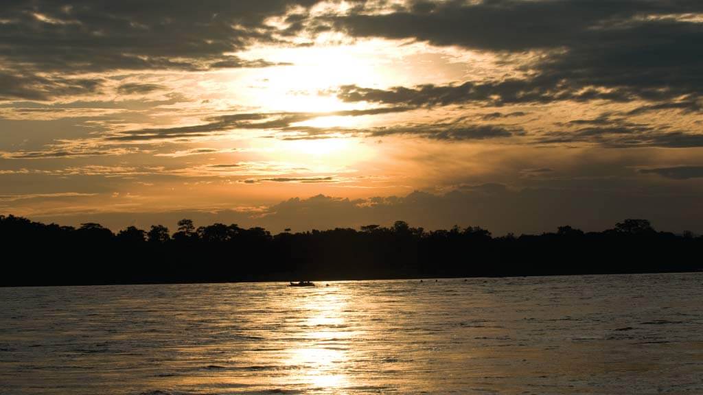 sunset over the napo river tena ecuador