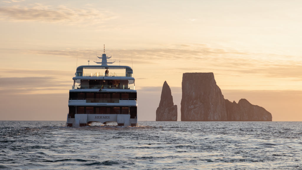 hermes-catamaran-sunset-with-kicker-rock galapagos islands