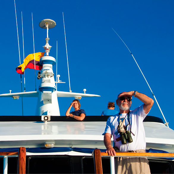 Galapagpos tourists on board their cruise yacht