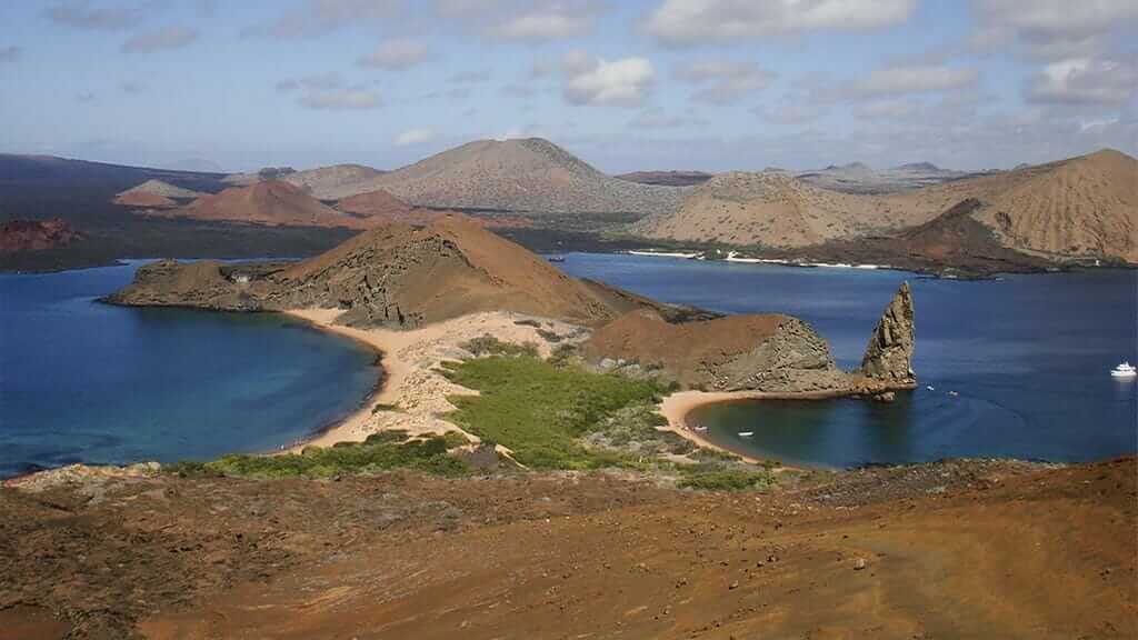 Bartolome island - a panoramic view of pinnacle rock and beach at the Galapagos islands