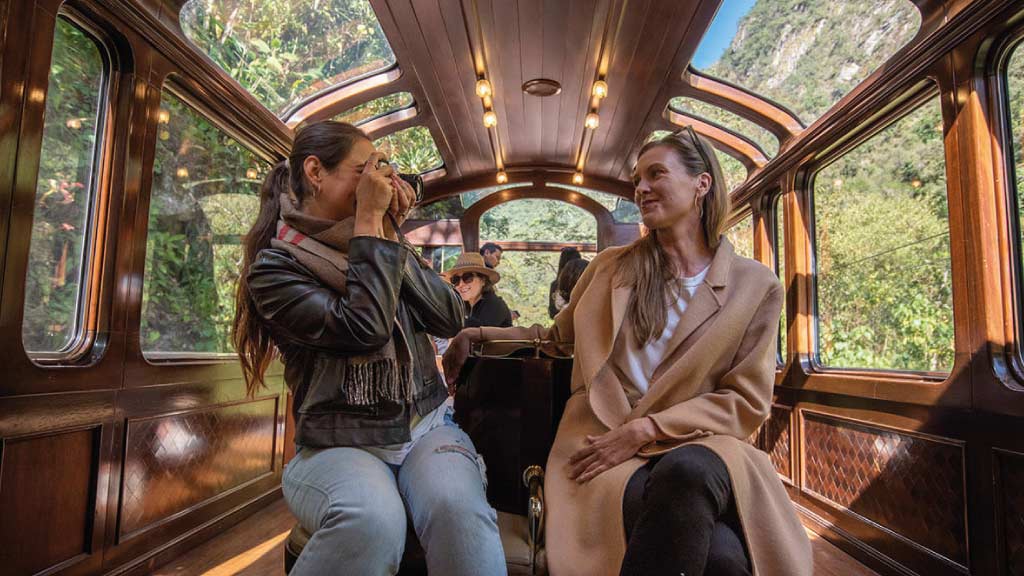 two-women tourists-in-machu-picchu-train