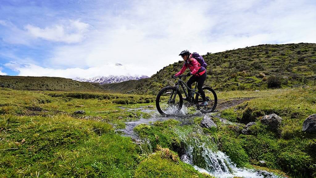 ecuador mountain biking over stream