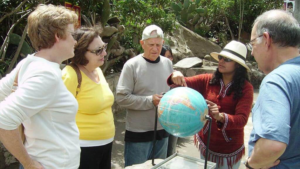 tourists at inti nan equator tour quito